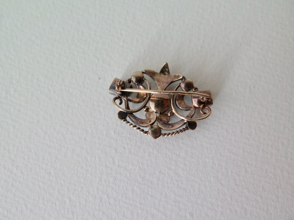 Antique Brooch, 18k Rose Gold Layered Openwork, Rubies, Rose-cut Diamonds and Emerald, early 1900s