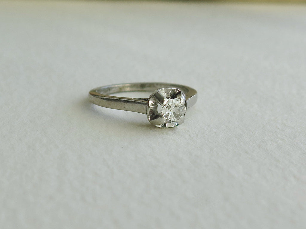 Antique Art Deco Platinum Diamond Solitaire Ring (0.25 ct)