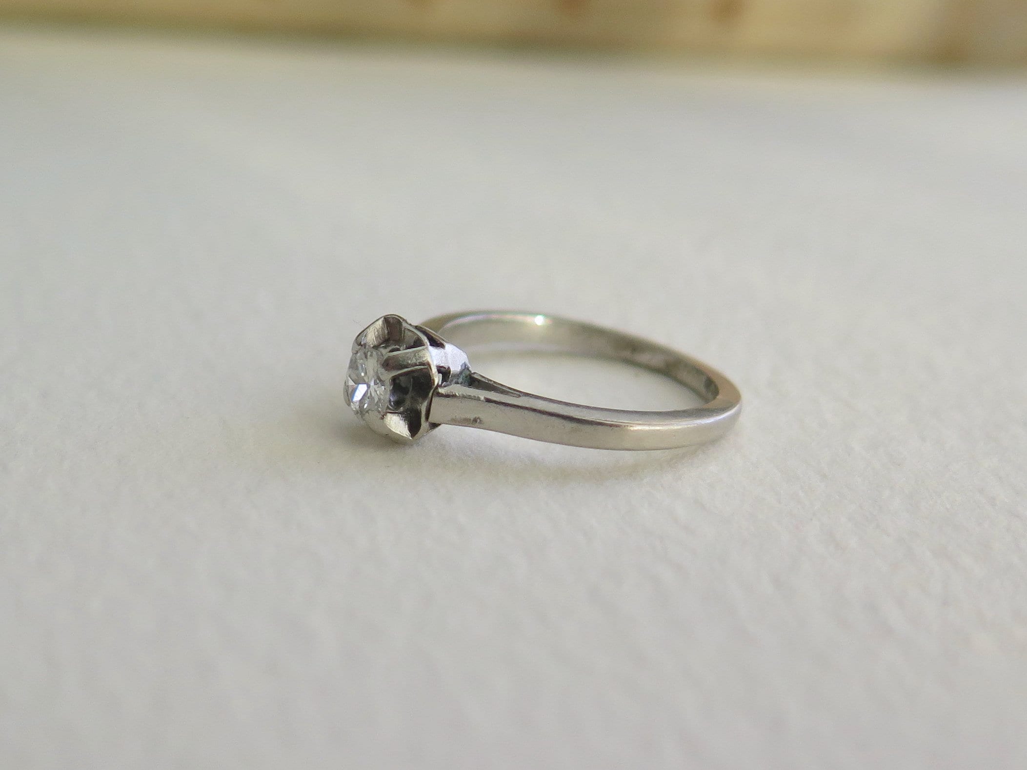 Antique Art Deco Platinum Diamond Solitaire Ring (0.25 ct)