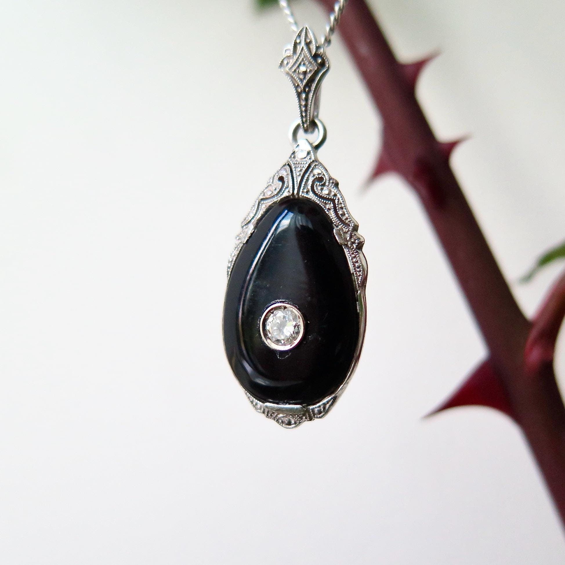 Antique necklace, onyx and diamond